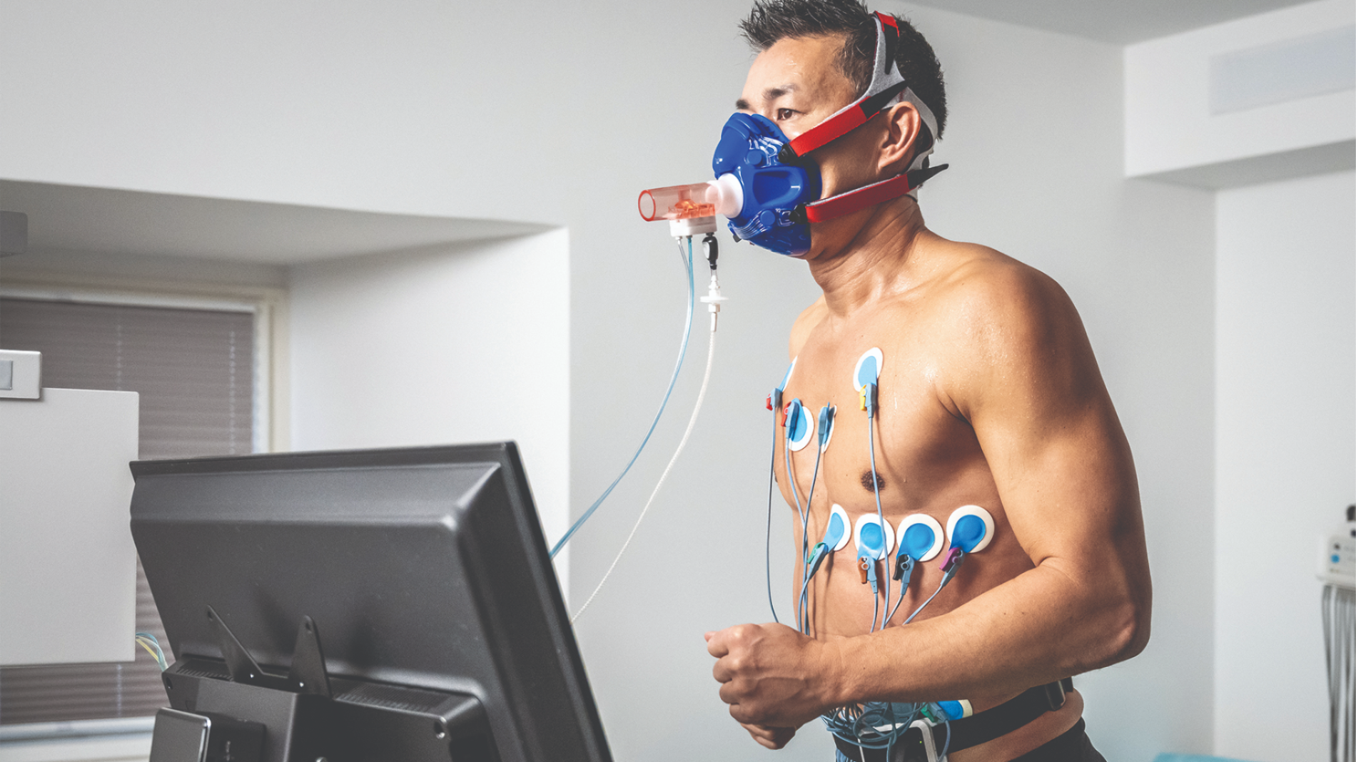 Man using a cardiopulmonary exercise testing machine